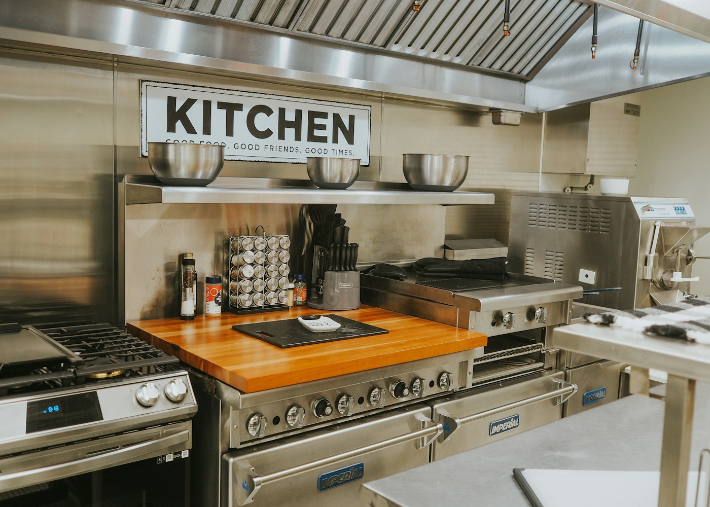 Back-of-house in a working Lakeland restaurant — daylight, stainless steel